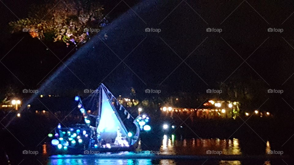 A ship ventures into the misty night along the waters of Discovery River during Rivers of Light at Animal Kingdom at the Walt Disney World Resort in Orlando, Florida.