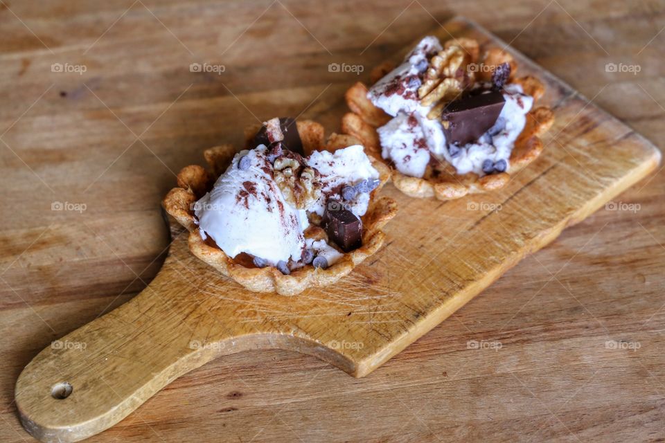 Close-up of ice creams on cutting board