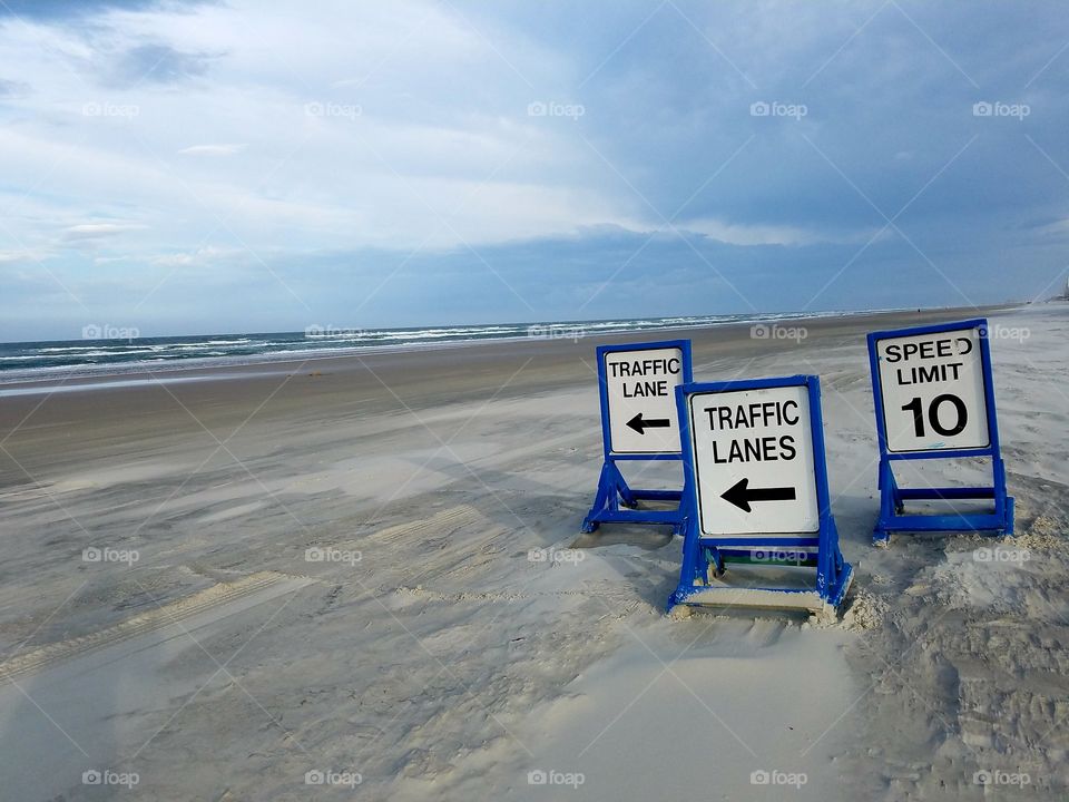 traffic signs on the beach at dautona, Florida