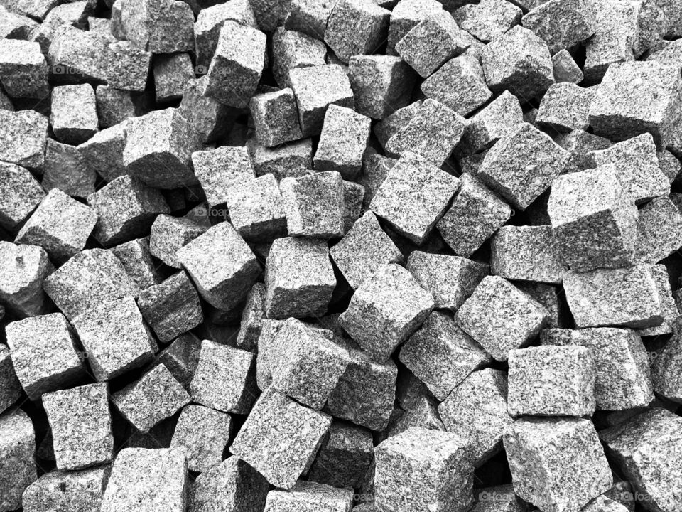 Graphic geometrical black white square texture blocky industrial hard edgy rough repetition form cool stone old authentic  