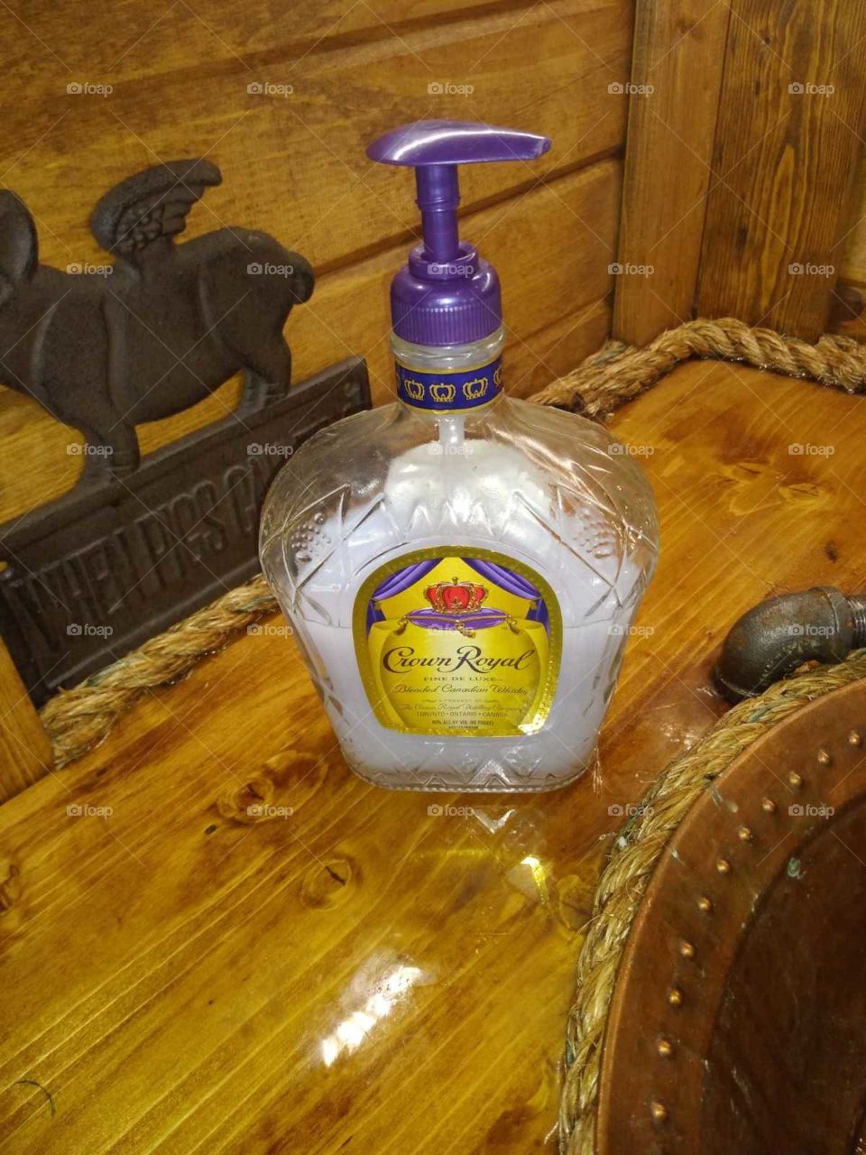 The amazing Pig and Pepper bbq restaurant in Fort Smith, Arkansas has grrrreat creative owners& employee's: transformed a Crown Royal bottle into a soap/hand sanitizer dispenser fabulous!!!