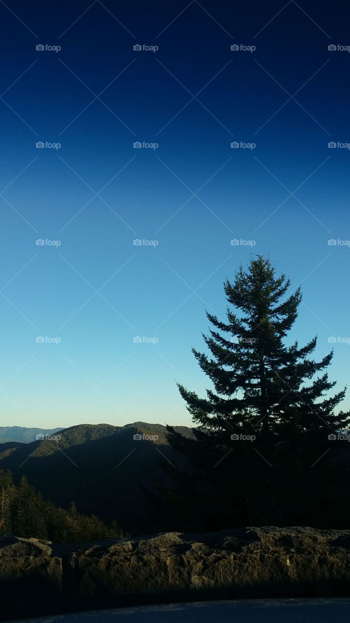 Smokey mountain hill. sky is blue