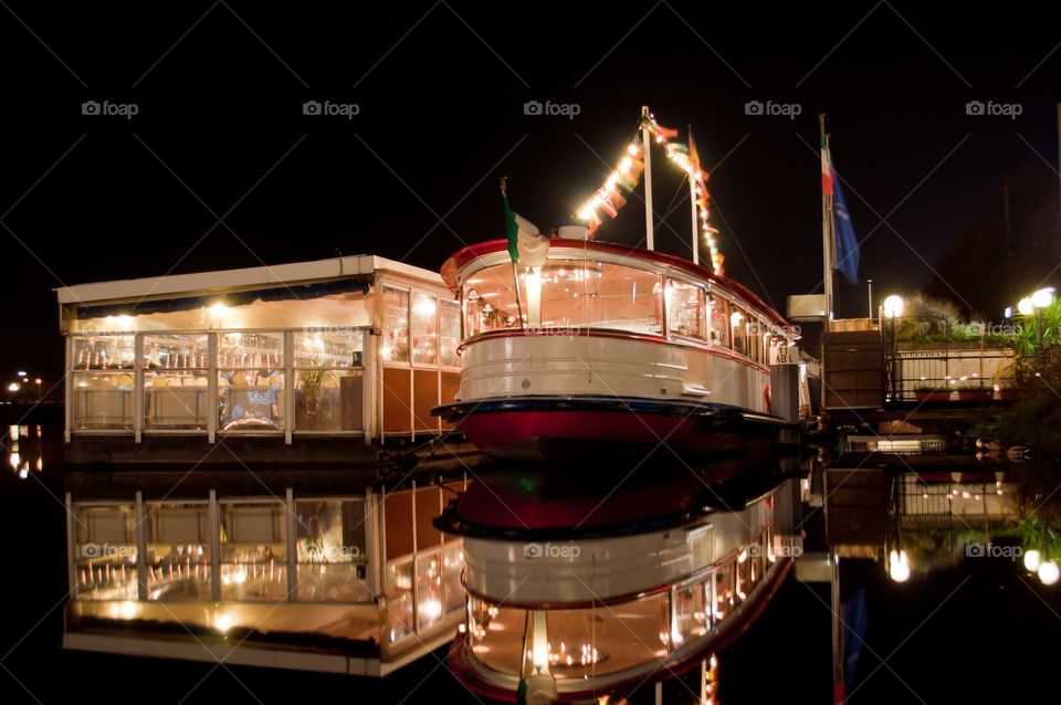 A ship on the lake Alster at night.