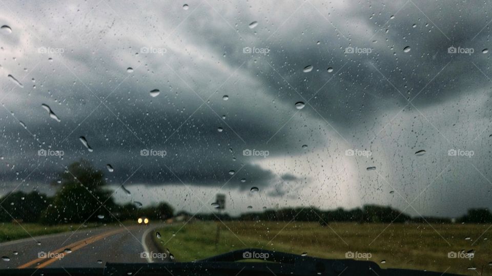 Stormy road in late summer rain