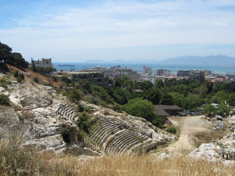 Visiting ruins by the sea