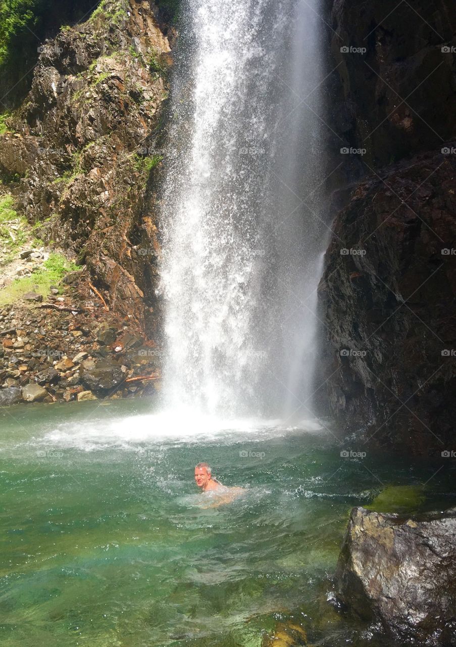 Swimming in the waterfall