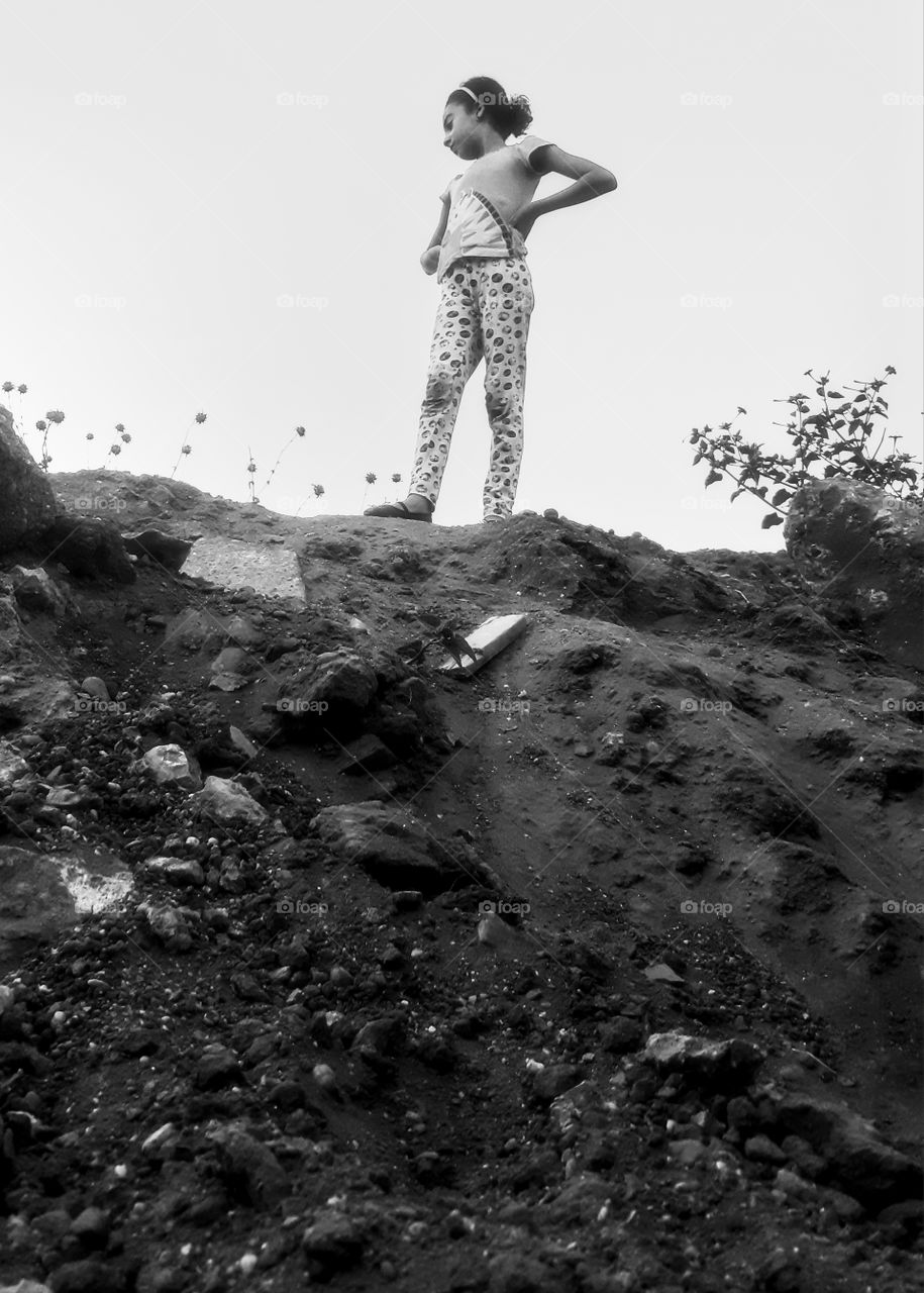Back and white photography of Girl on the hill landscape