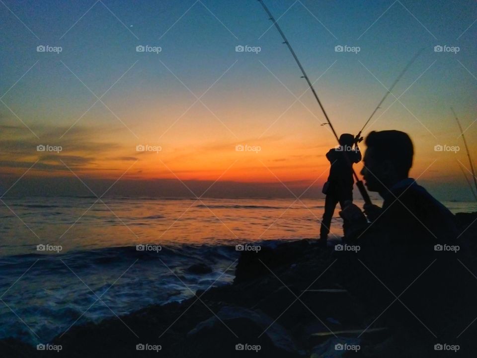 fishing at dusk
