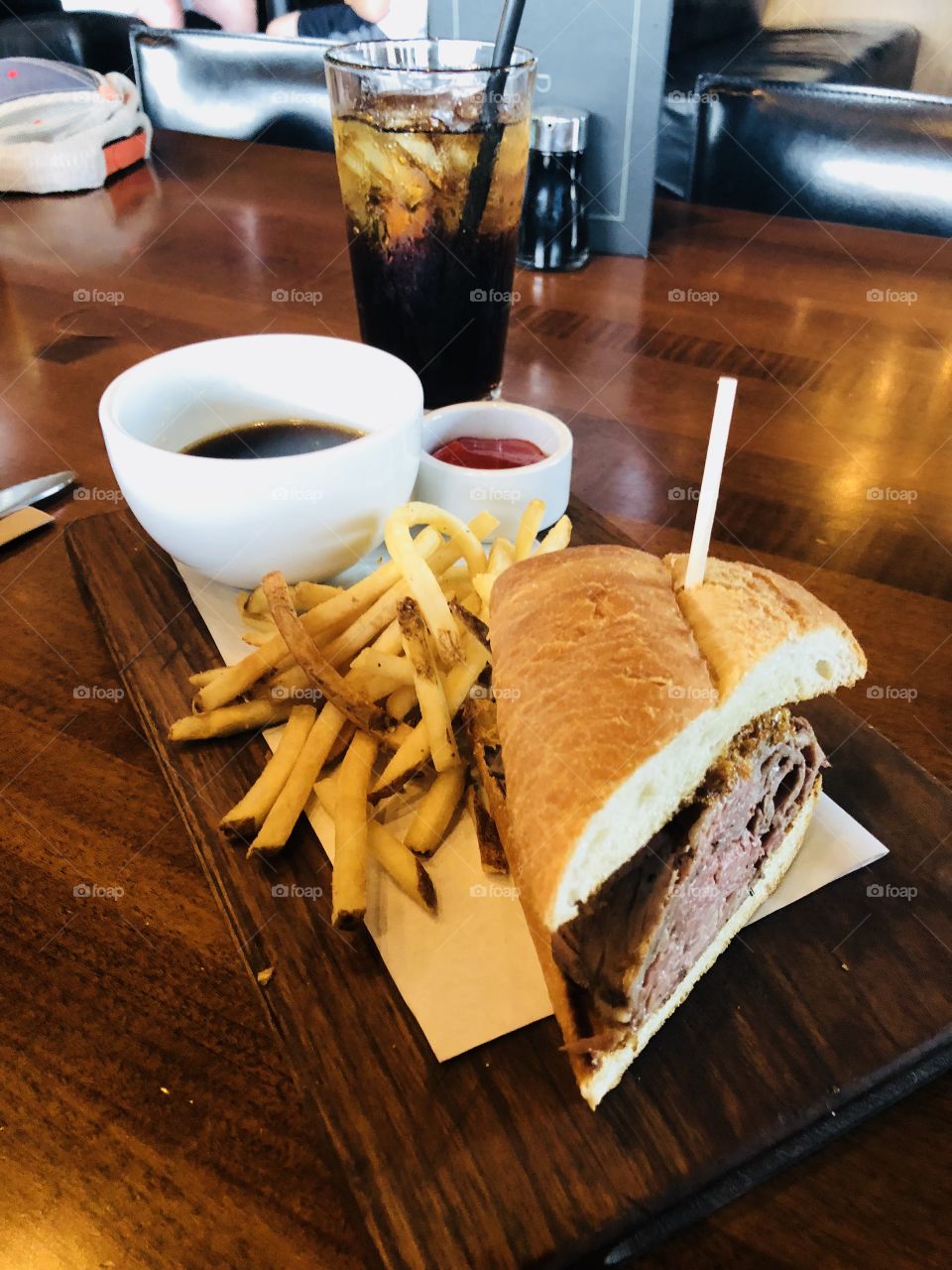 Splitting lunch has never been so easy. Delicious shaved beef sandwich with a side of skinny fries and au hi for dipping. 