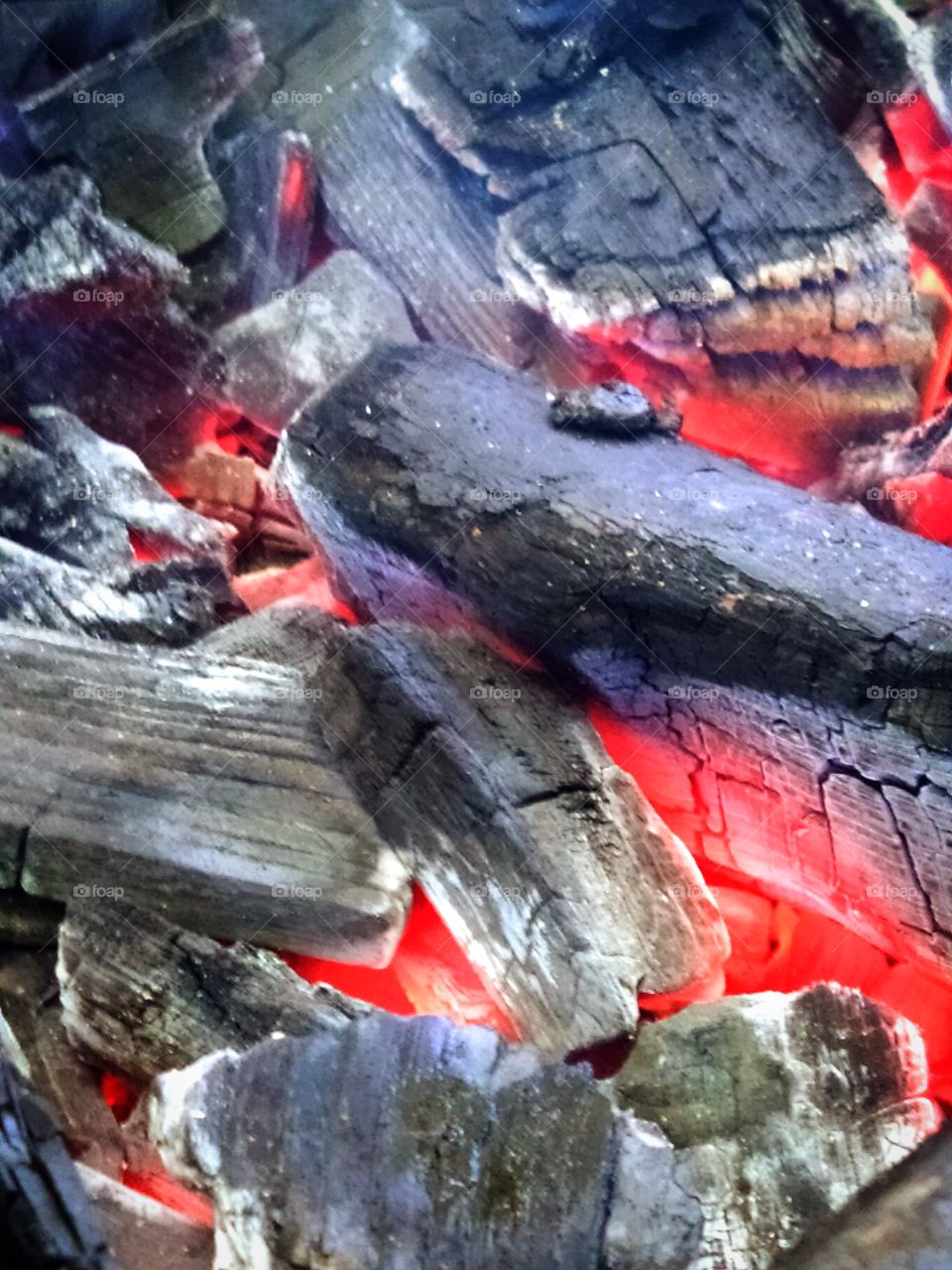 Charcoals that burn and glow