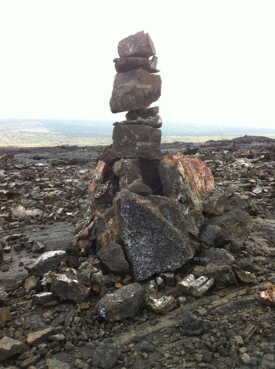 standing rock formation. I stumbled upon this tower of rocks while walking a lava field just outside of Kona, Hawaii.