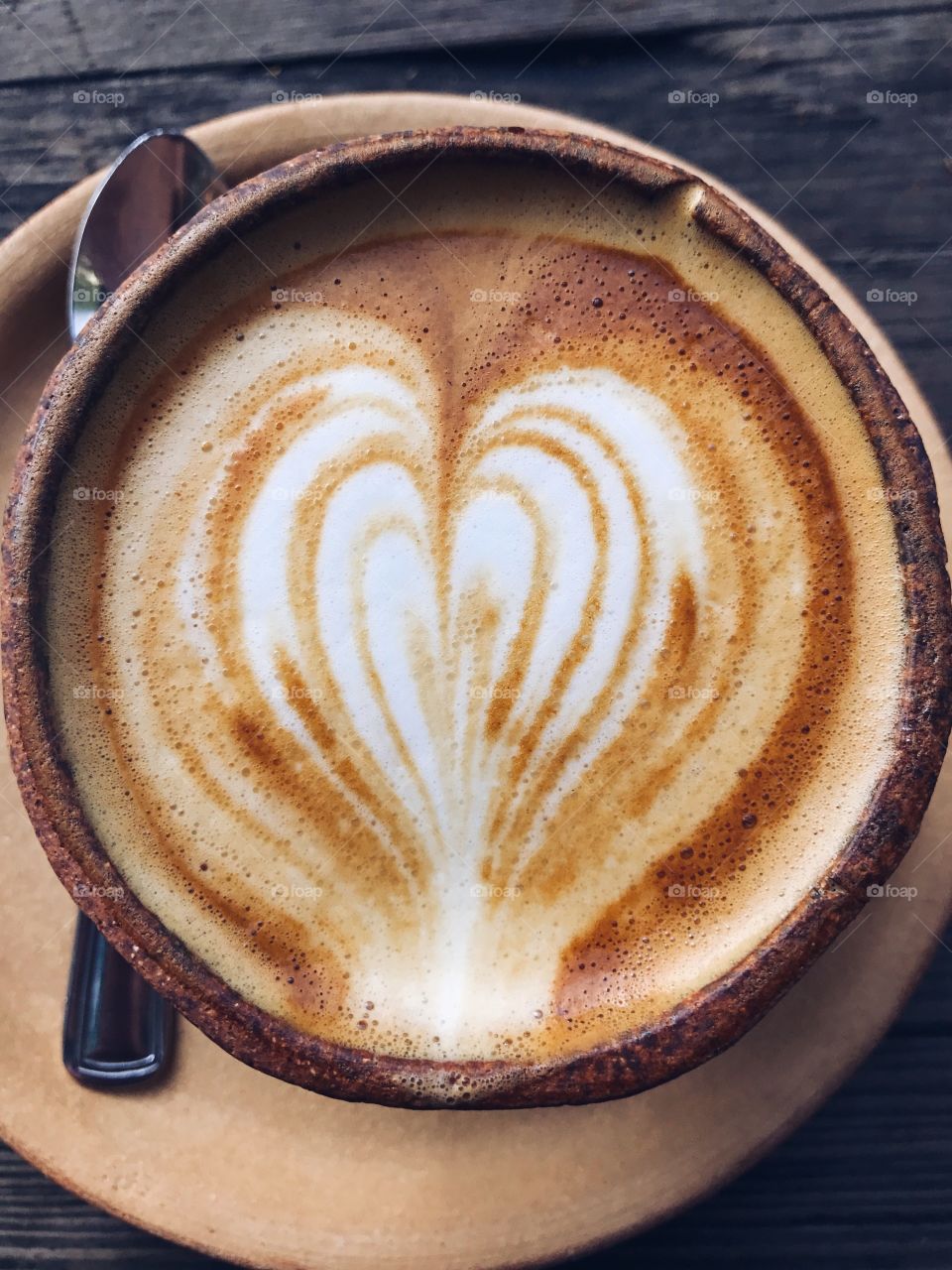 Textured cappuccino foam coffee art.