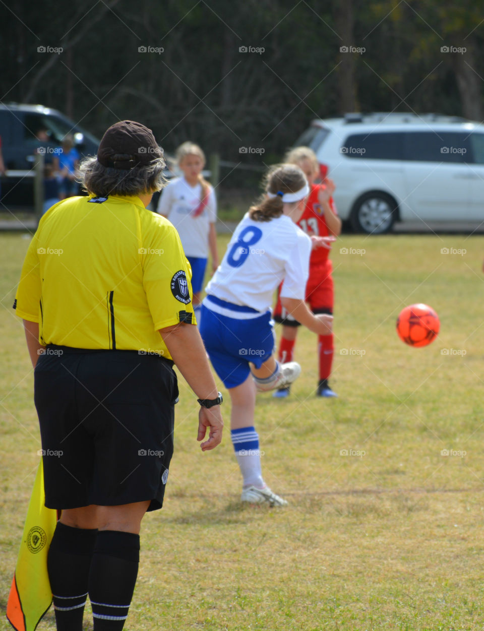 It’s soccer time! Referee managing game!