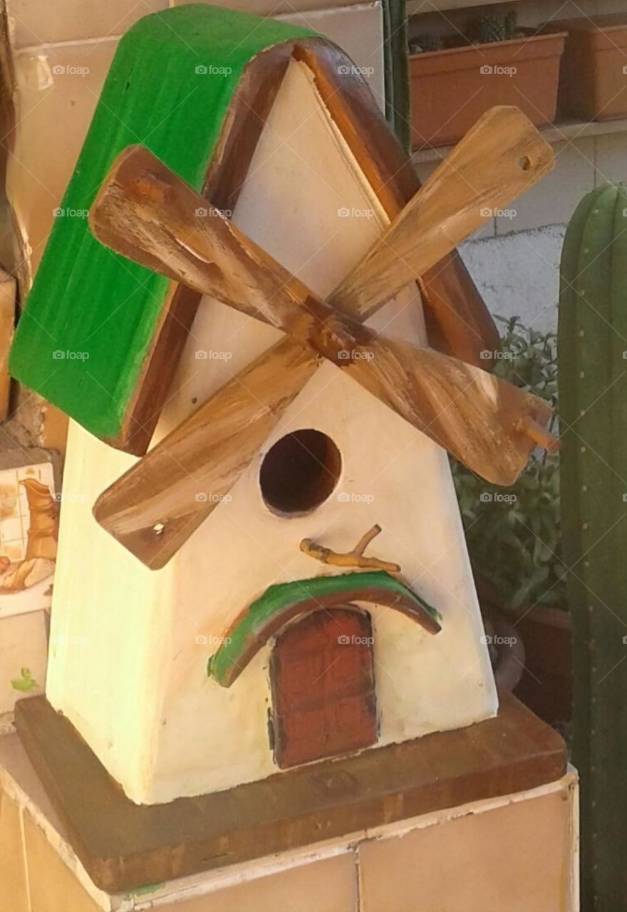 casita para pájaros de madera