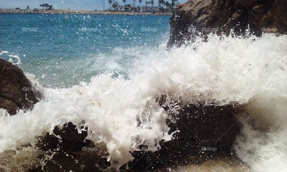 ocean splash. the waves splashing off the rocks