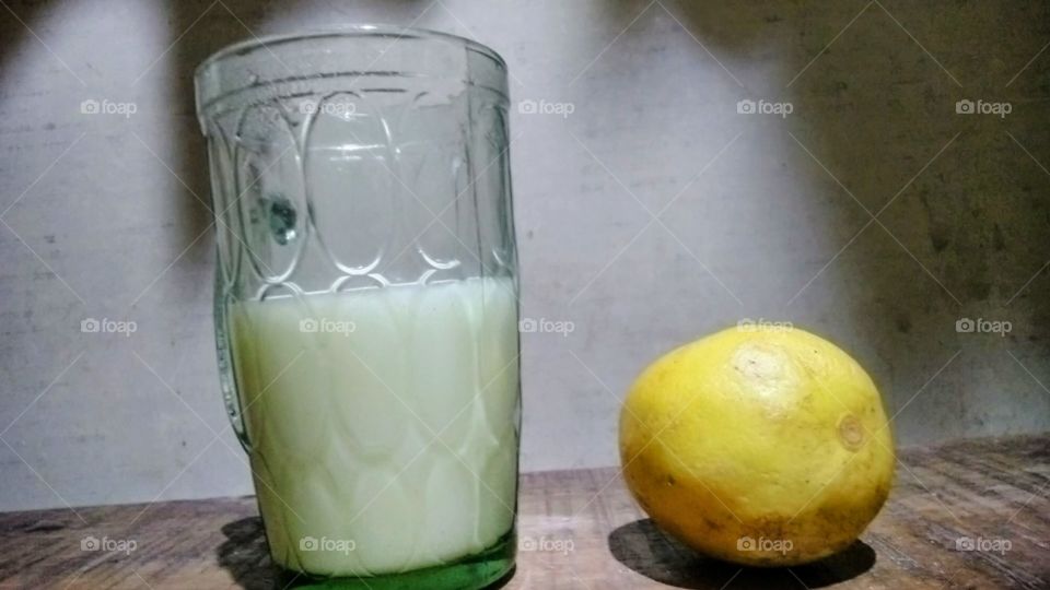 Warm milk mixed with lemon.