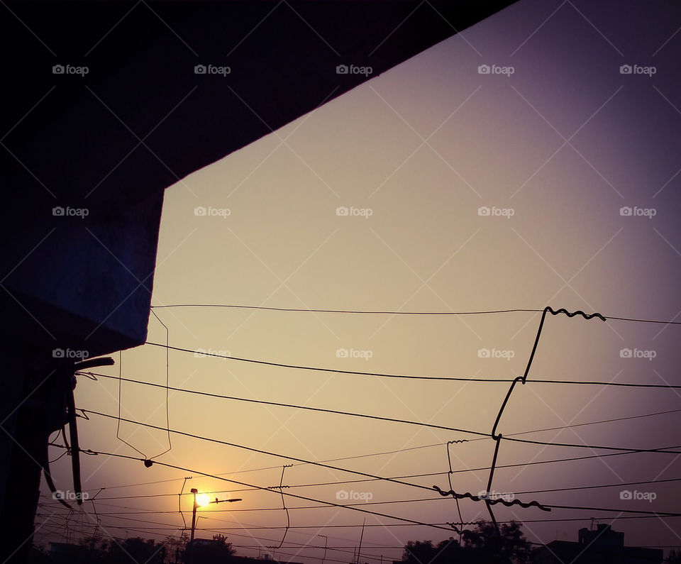 Title- Beautiful sunset
Description- Beautiful sunset image captured from a window.