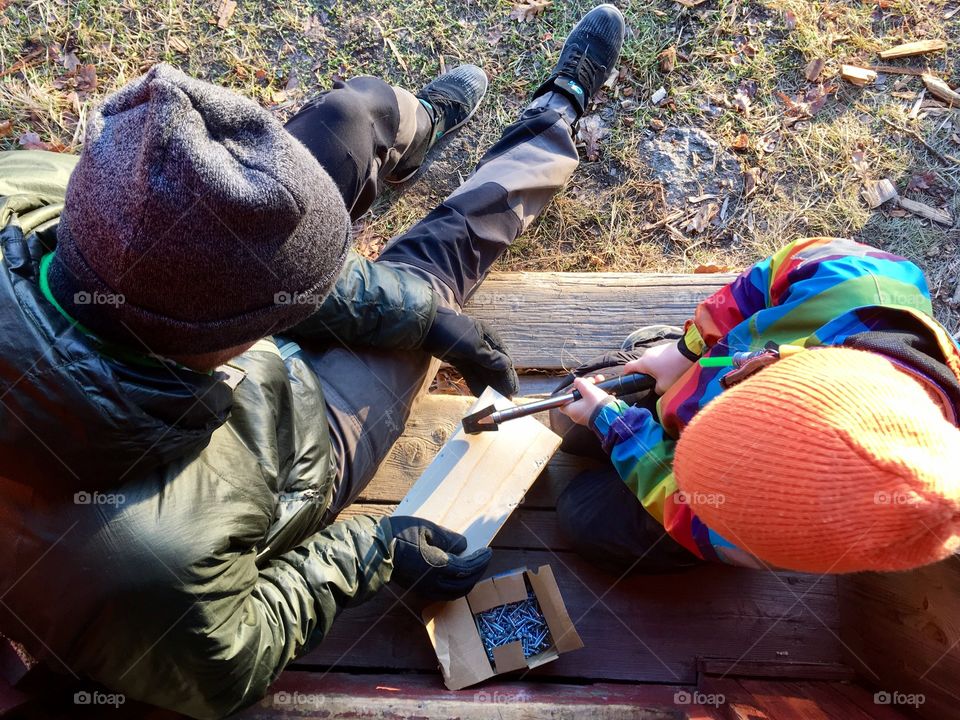 Dad and son carpentry together