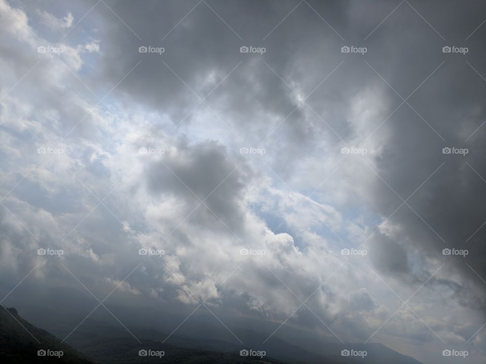 Cloudy Day from Atop Sugar Mountain  In Banner Elk, North Carolina, USA.

Alternate Title: Knocking on the Sky 2
