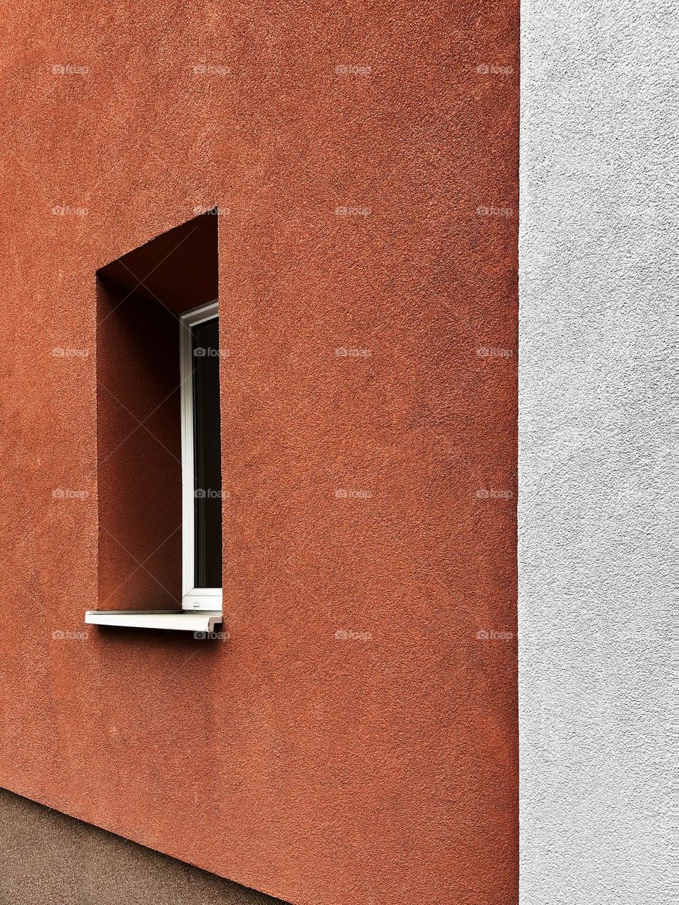 Window in orange wall