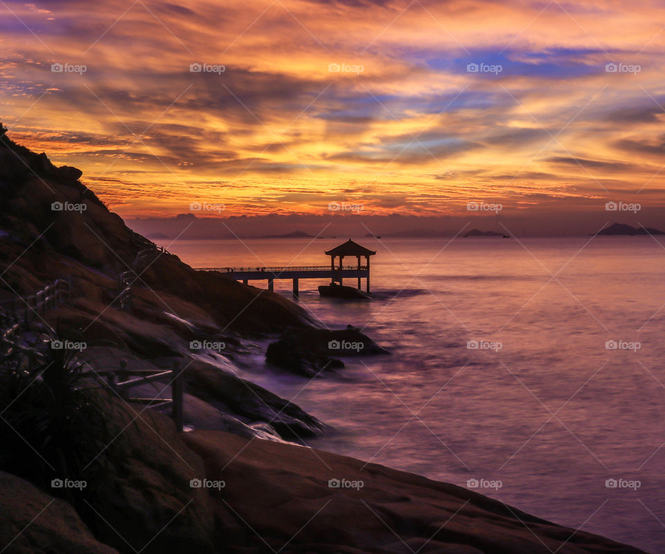 The Tranquility of Coastal Trail area at Sunrise Dawn. An Amazing Experience when a Burning Skies and good Compositions mis together to Create such an Image Like This.