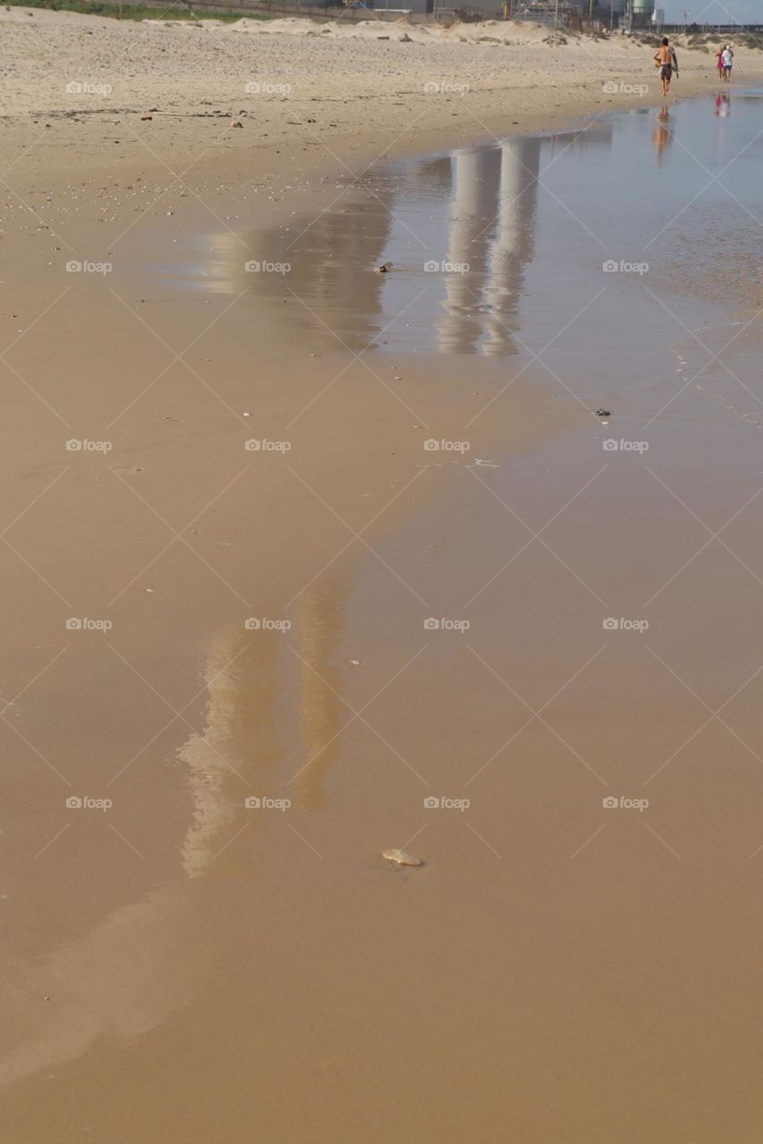 Reflection on the beach chimney 