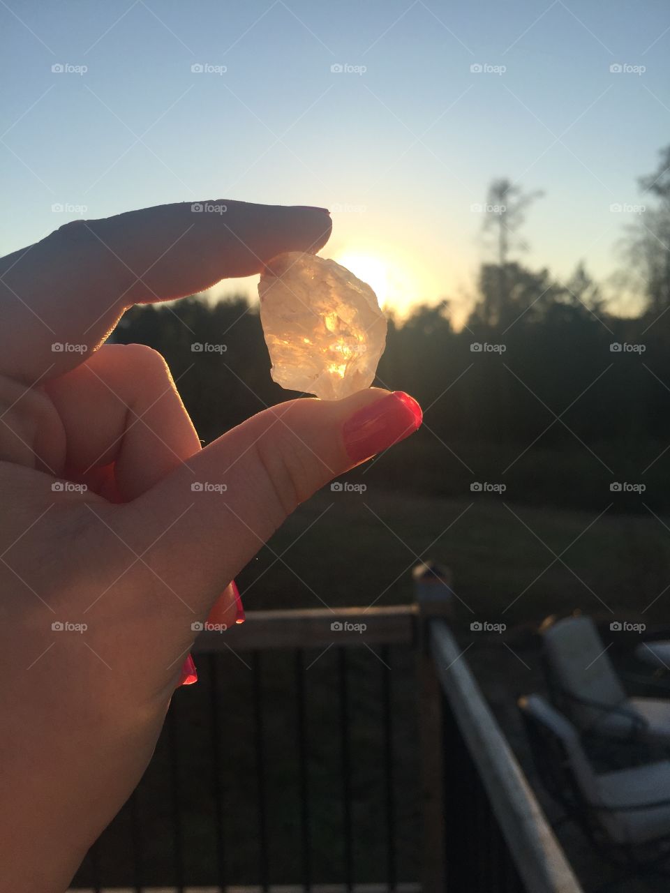 Sun behind a beautiful piece of quartz 