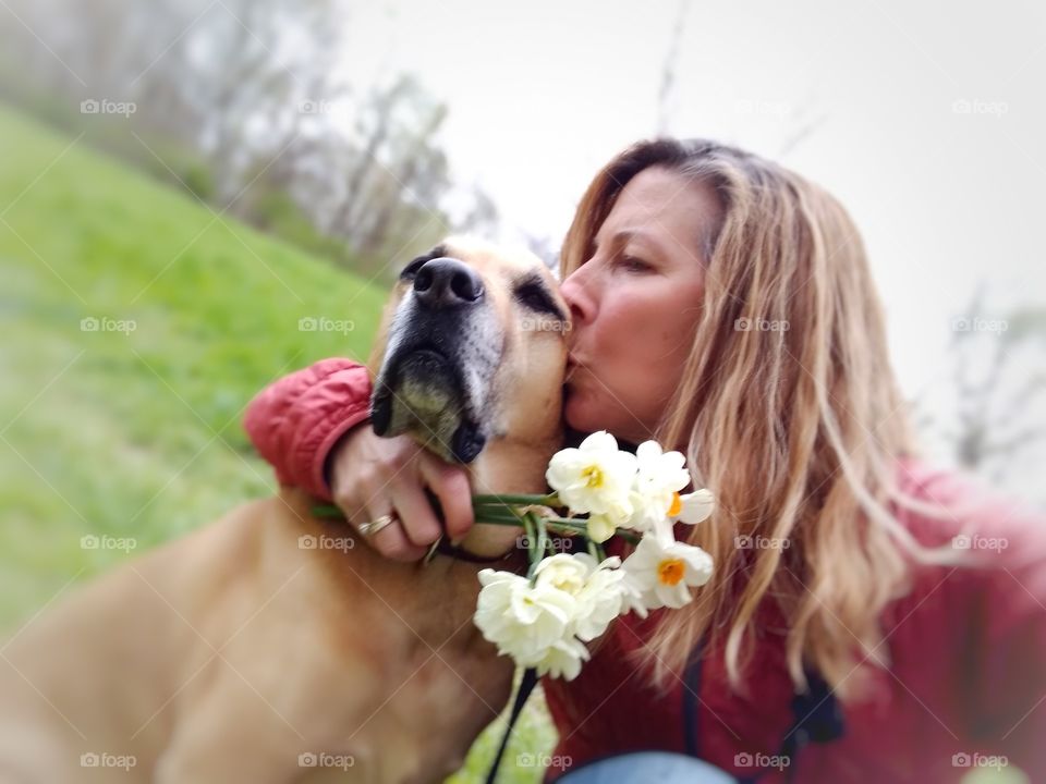 Girls best friend 🐾❤️ Dog momma with her loyal companion.  My soulful spirit that gives me unconditional love,  genuine joy and happiness just being in the moment enjoying springtime.  I am his person,  he is my strength, my protector and my love.