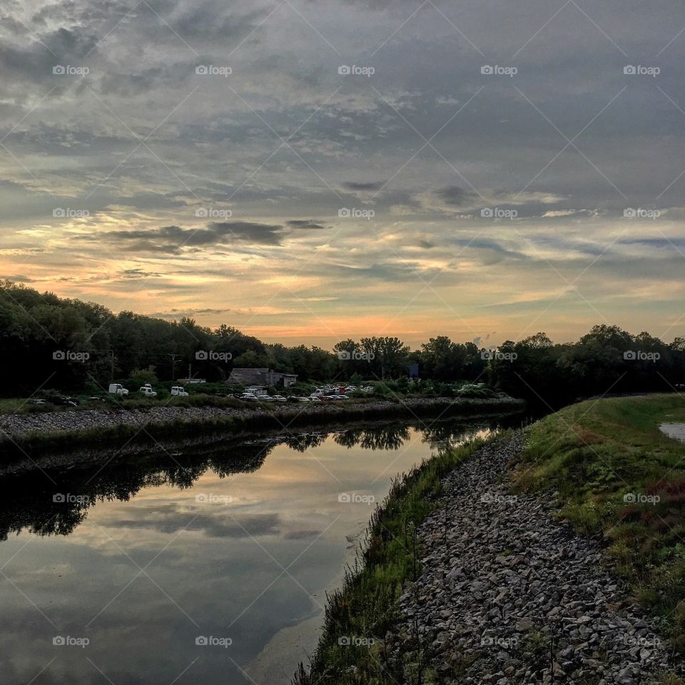 River Reflections at Sunset