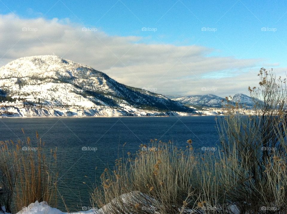 The view of Winter's arrival from the trail across the lake.   