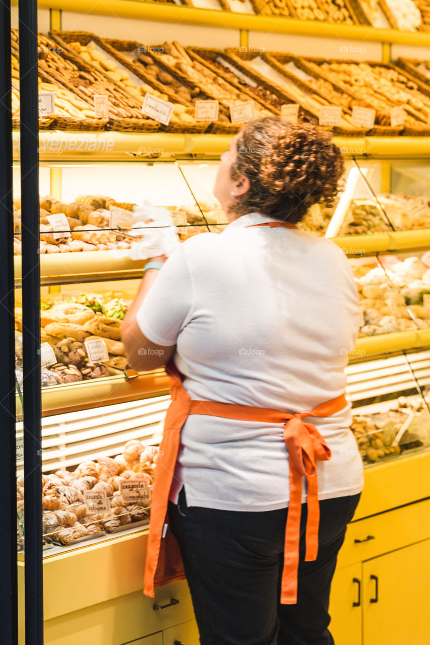 Sales Woman In The Bakery Shop
