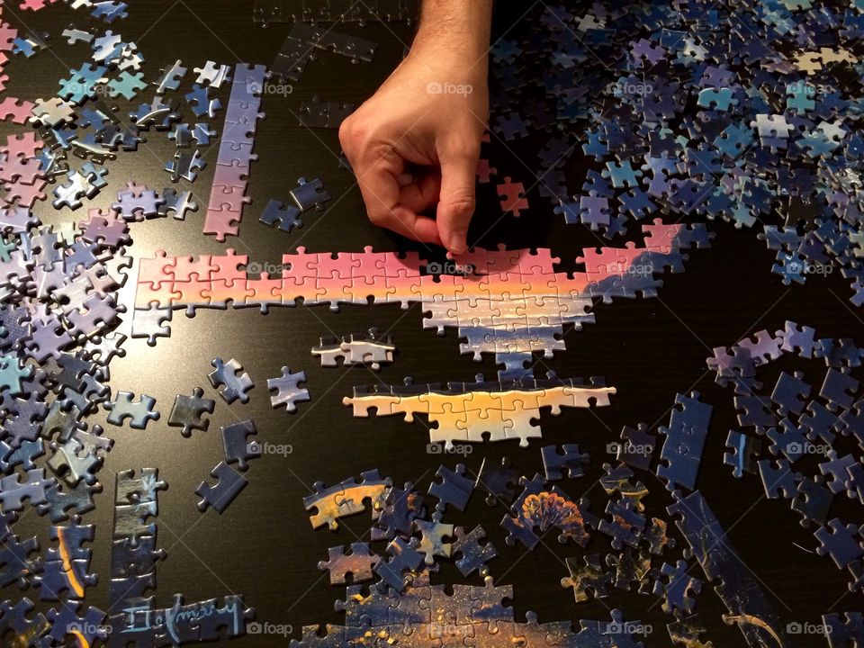 Man playing puzzle