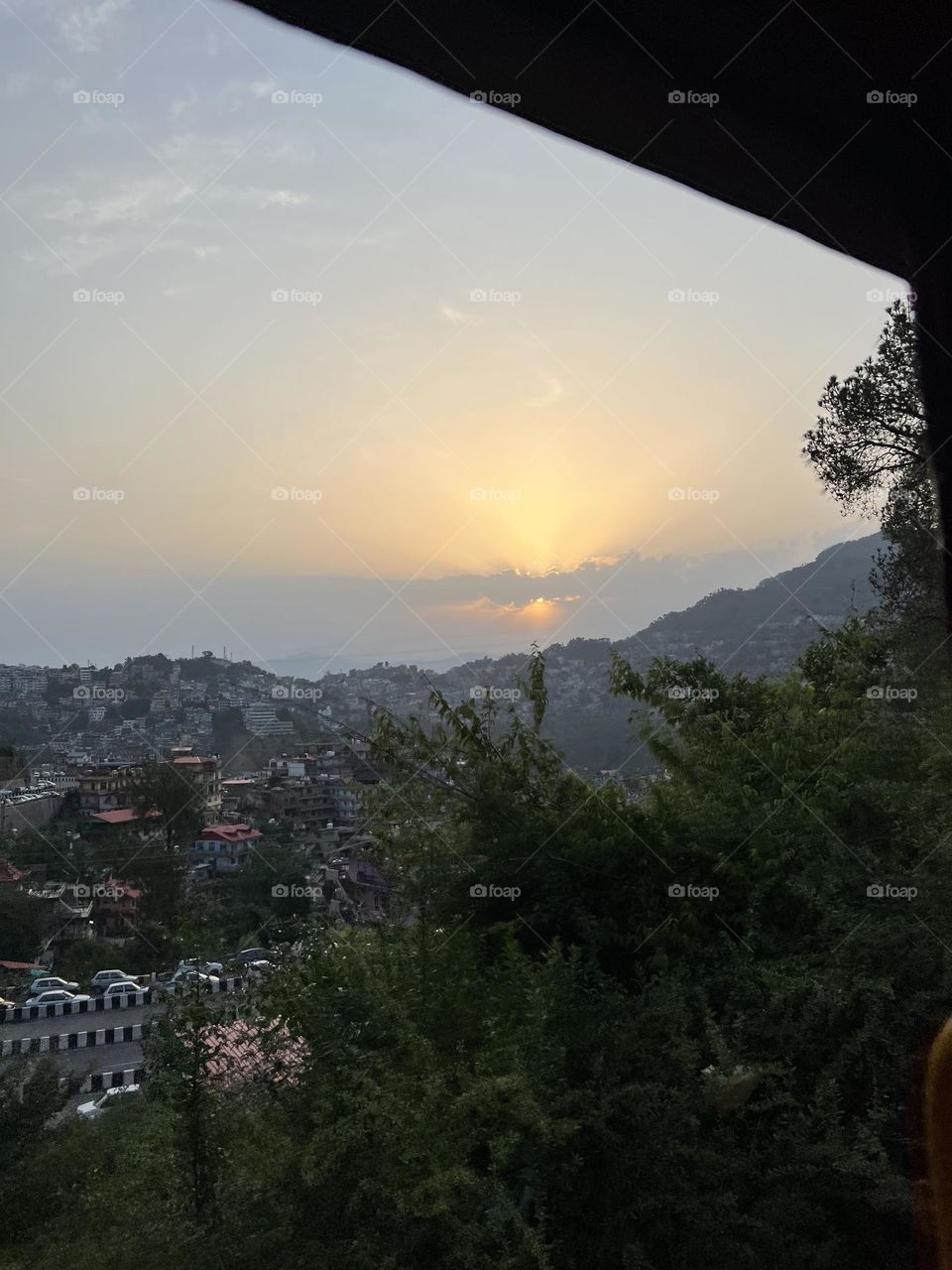 SUNRISE BETWEEN THE CLOUDS