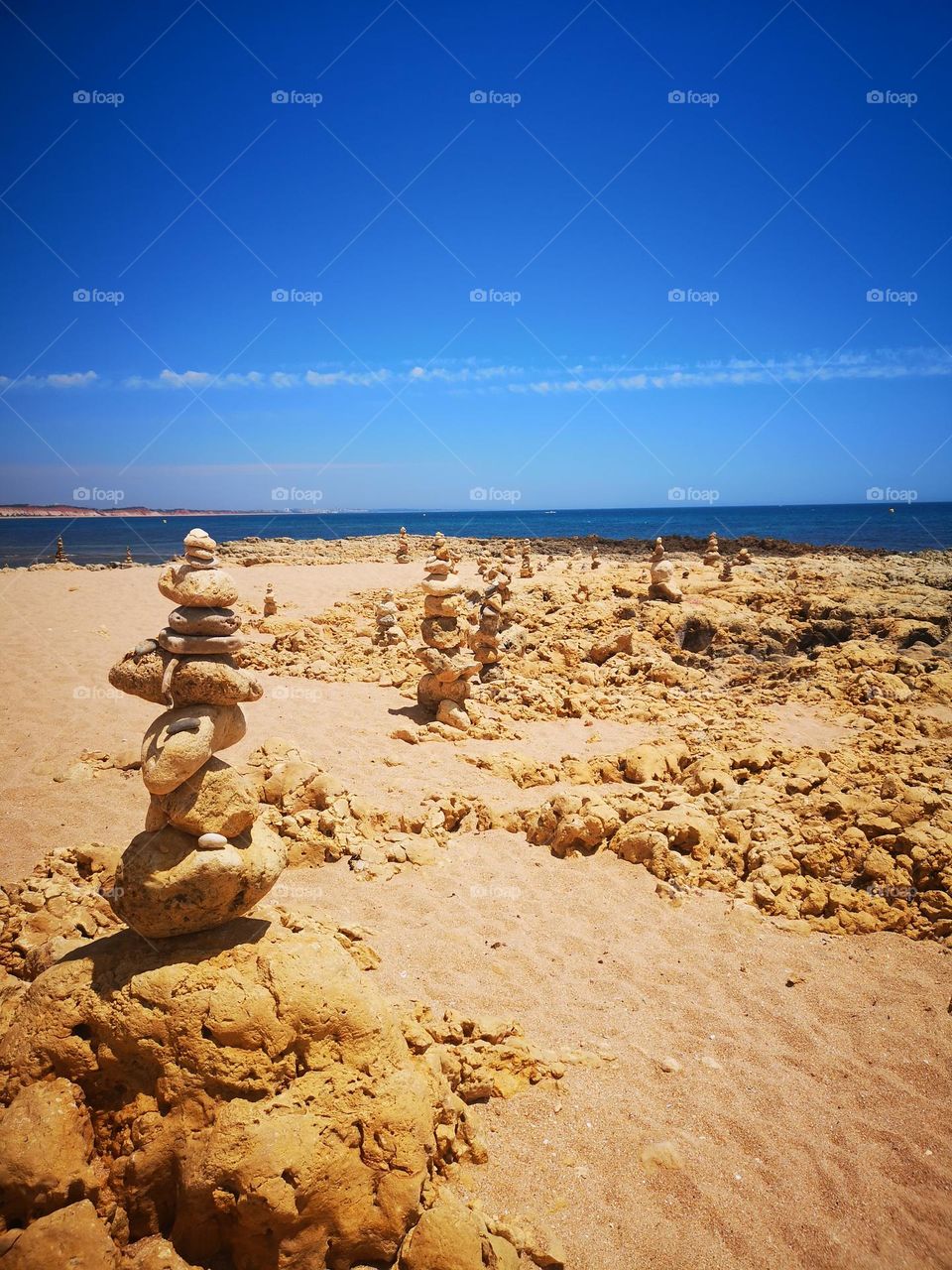 Stone Piles Art on Beach in Albufeira