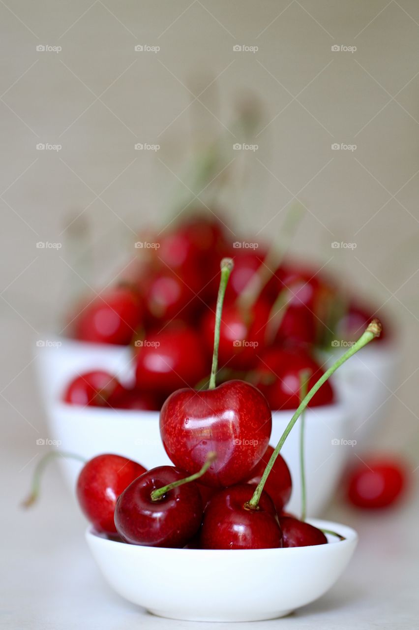 Cherry in white bowl
