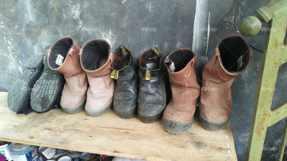 Safety shoes on top of rack