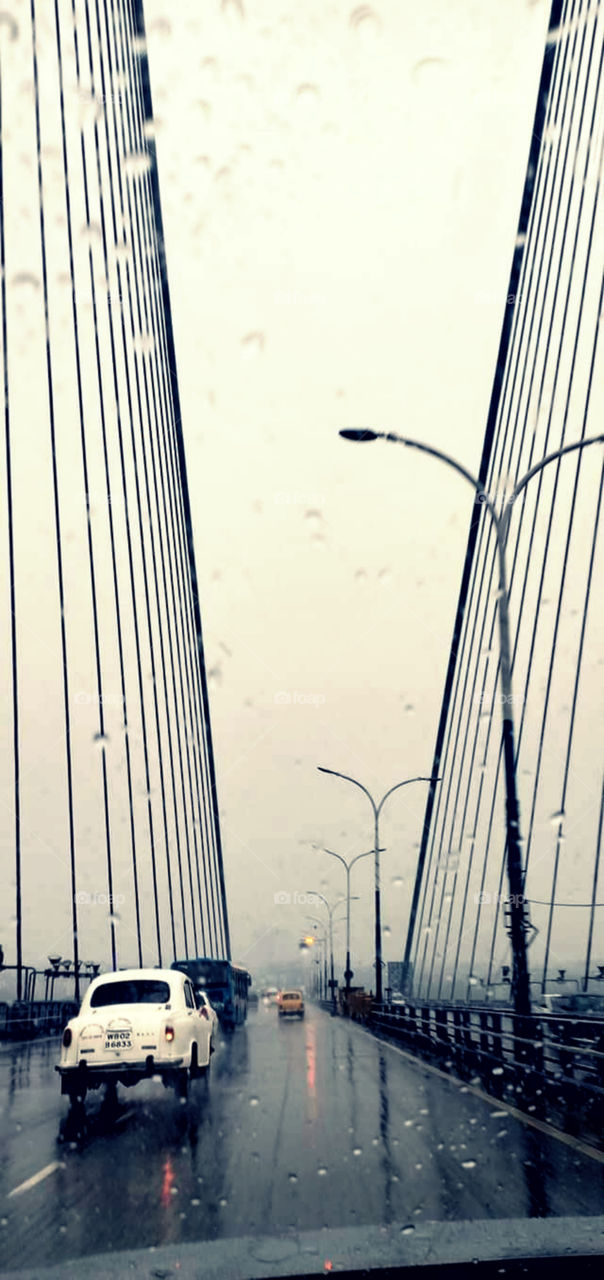 A beautiful view captured.Water drops steam on car window glass background.