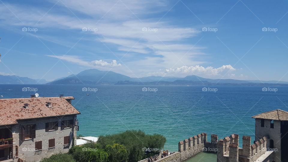 View over houses, Sea and Mountains