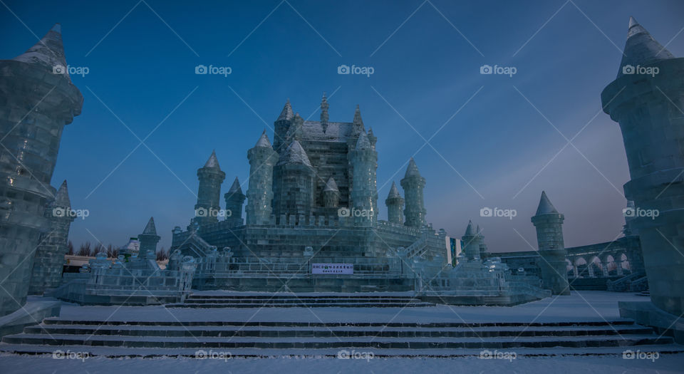 Asia china  Harbin ice Festival snow Festival ice sculptures snow building  snow ice in  sunset