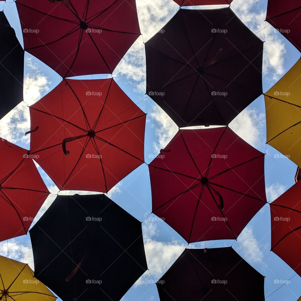 umbrellas in the blue sky