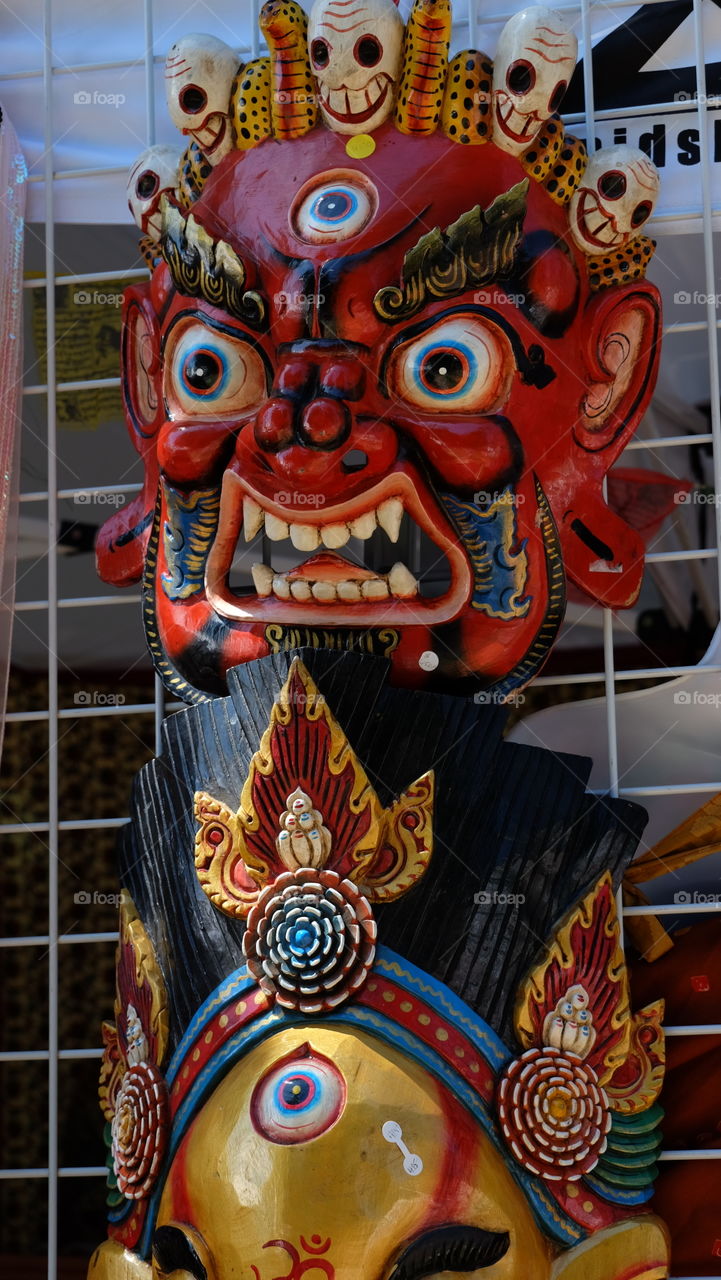 Souvenirs in market, decorative masks