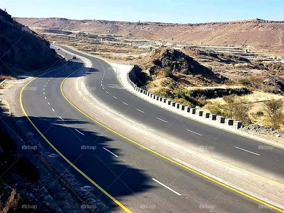 A stunning view of green mountains covered in fog in Yemen