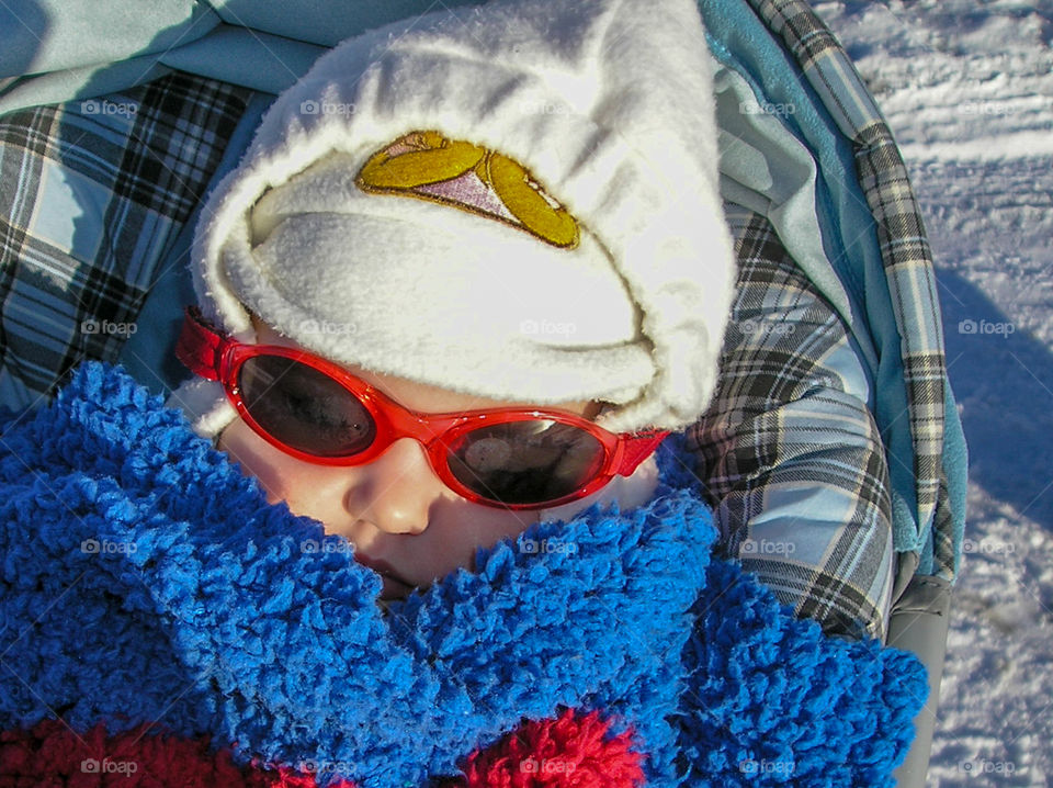 It was a very sunny but brr cold day so we took our little angel out for a walk/nap. You can just see that her eyes are closed. She was snuggled up in a sleeping bag & her favourite blankie. As long as we kept moving she kept sleeping! 😴