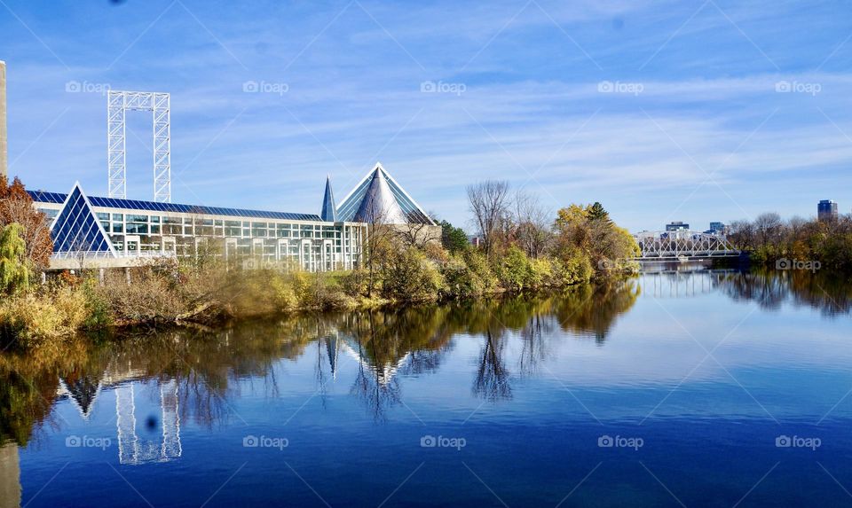 This unique architecturally designed building earned the nick name, “the pinball machine”. It sits on the bank of the Rideau River near Rideau Falls, Ottawa, Canada.