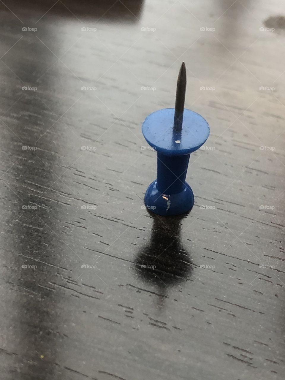 Thumbtack shadows and light