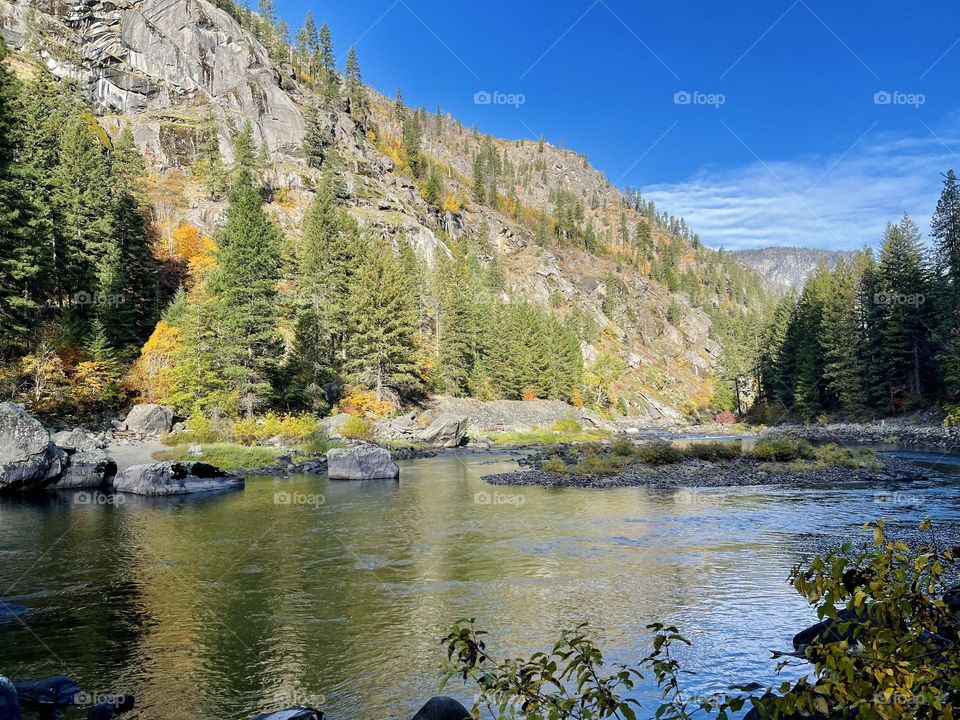 Mountains autumn landscape with the river 