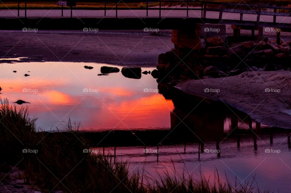 reflections. the Beautiful sunset reflects into the creek during low tide