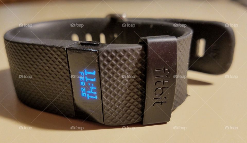 Fitbit wrist health tracker in black.