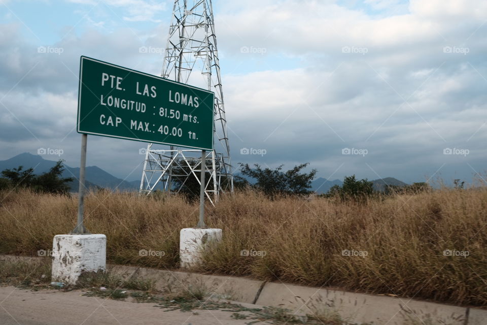 Green information sign on the runway