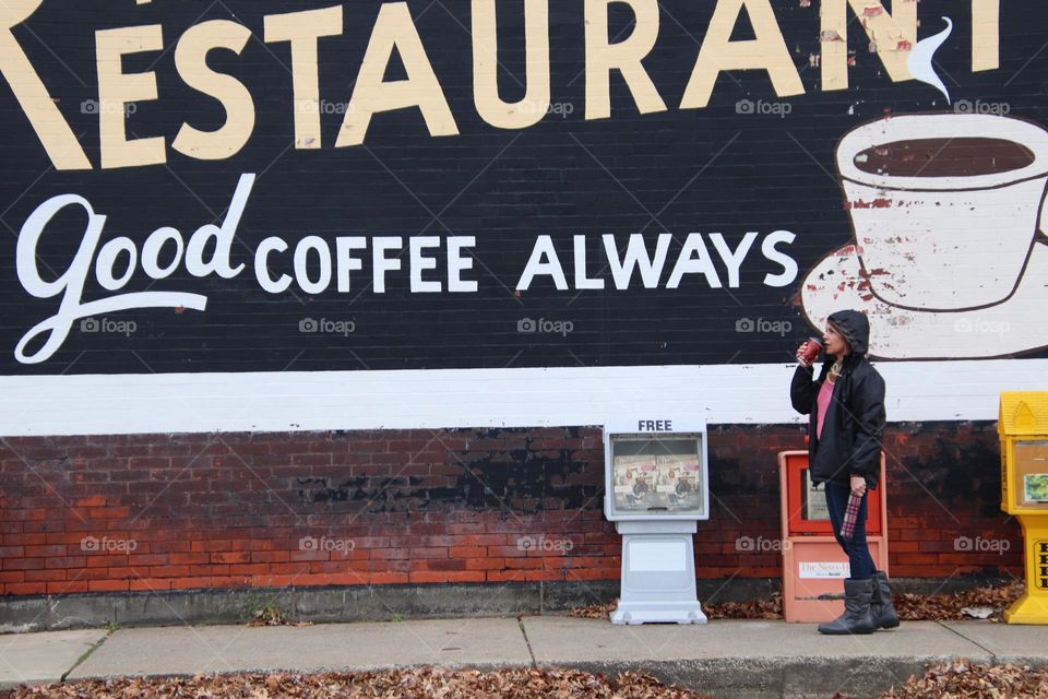 City mural good coffee with woman drinking coffee